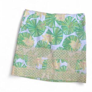 Lilly Pulitzer green and yellow mini skirt with lace stitching and lily pad frog